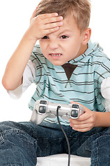 Image showing Boy playing with Joystick
