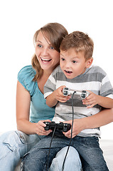 Image showing Mom and son playing with Joystick