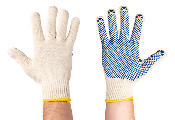 Image showing Male hand wearing working glove