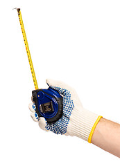 Image showing Hand with glove and tape measure