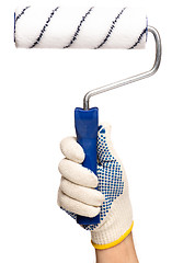 Image showing Hand with glove and paint roller