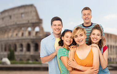 Image showing happy friends over coliseum background