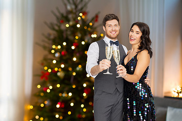 Image showing couple with champagne glasses at christmas party