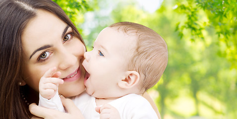 Image showing mother with baby over green natural background