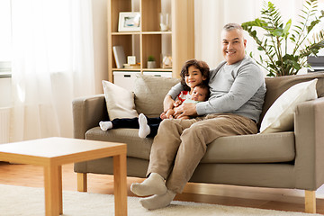 Image showing happy father with preteen and baby son at home