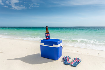 Image showing Esky thongs and a cold drink on the beach in Australia