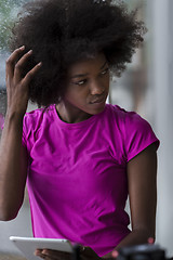 Image showing african american woman using tablet