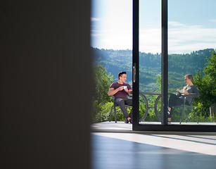 Image showing couple enjoying morning coffee and breakfast