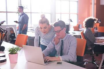 Image showing Two Business People Working With laptop in office