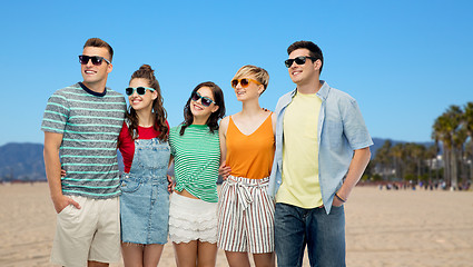 Image showing happy friends over venice beach background