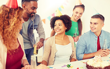 Image showing team greeting colleague at office birthday party