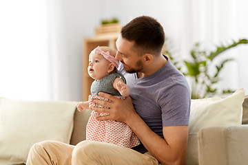 Image showing father with little baby girl at home