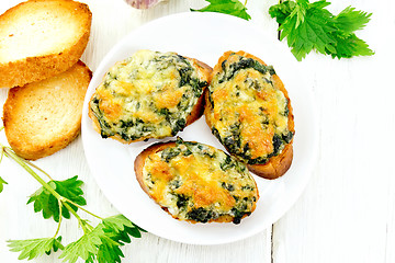 Image showing Sandwich of nettle in plate on light board top