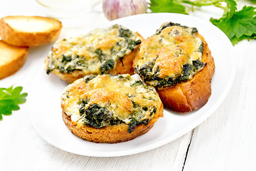 Image showing Sandwich of nettle in plate on light board