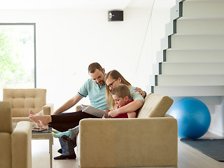 Image showing family with little boy enjoys in the modern living room