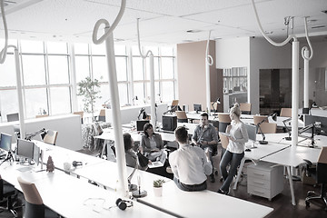 Image showing Young Business Team At A Meeting at modern office building