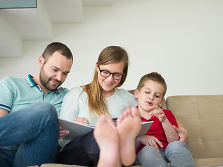 Image showing family with little boy enjoys in the modern living room