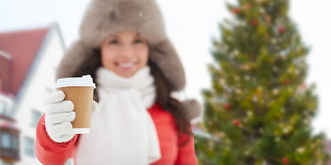 Image showing woman with coffee over christmas tree in tallinn