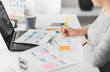 Image showing web designer working on user interface at office