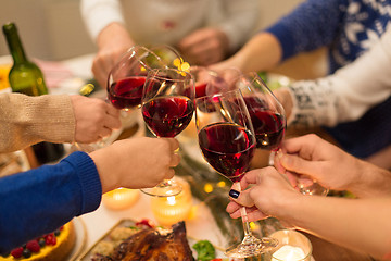 Image showing close up of friends with wine celebrate christmas