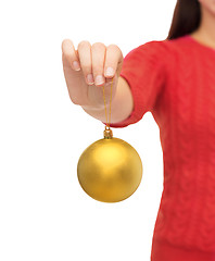 Image showing close up of woman hand holding christmas ball