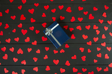 Image showing Gift boxes on wooden table