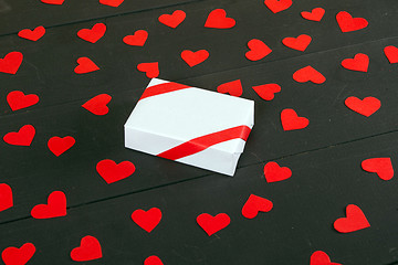 Image showing Gift boxes on wooden table