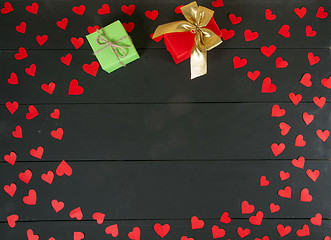 Image showing Gift boxes on wooden table