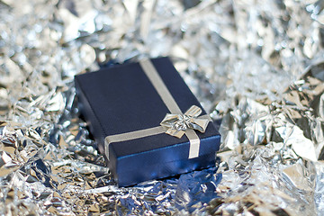 Image showing Gift boxes on wooden table