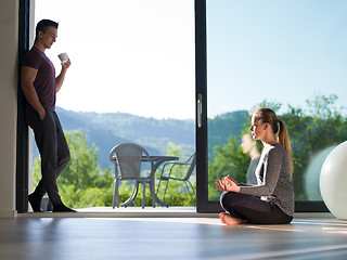 Image showing couple on the door of their luxury home