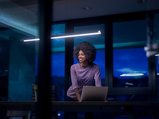 Image showing black businesswoman using a laptop in startup office