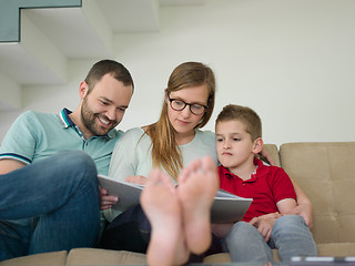 Image showing family with little boy enjoys in the modern living room