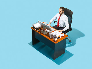 Image showing Shot from above of a stylish business man working on a laptop.