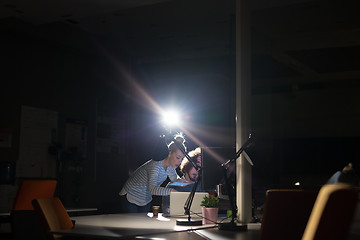 Image showing young designers in the night office