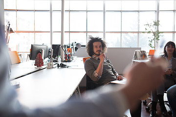 Image showing Young Business Team At A Meeting at modern office building