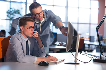 Image showing Two Business People Working With computer in office