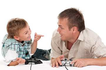 Image showing Dad and son playing with Joystick