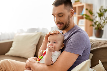 Image showing happy father with little baby daughter at home