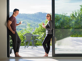 Image showing couple on the door of their luxury home villa