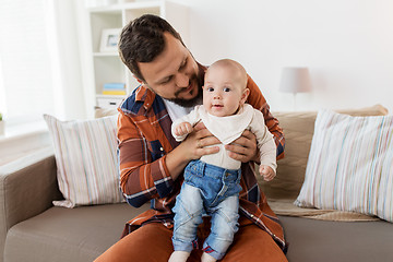 Image showing happy father with little baby boy at home