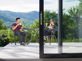 Image showing couple enjoying morning coffee and breakfast