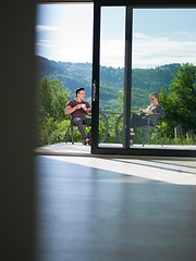 Image showing couple enjoying morning coffee and breakfast