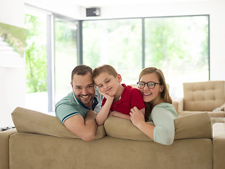 Image showing family with little boy enjoys in the modern living room