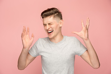 Image showing Handsome man in stress isolated on pink