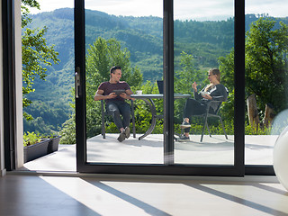 Image showing couple enjoying morning coffee and breakfast