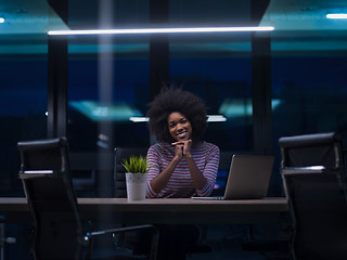 Image showing black businesswoman using a laptop in startup office