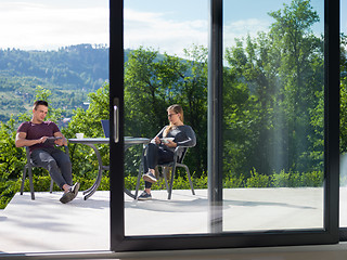 Image showing couple enjoying morning coffee and breakfast