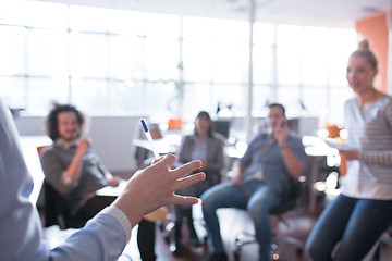 Image showing Young Business Team At A Meeting at modern office building