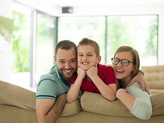 Image showing family with little boy enjoys in the modern living room