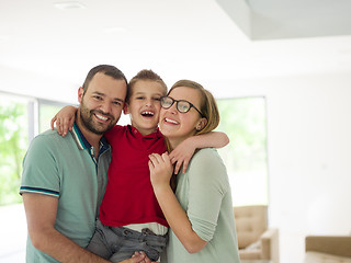 Image showing family with little boy enjoys in the modern living room